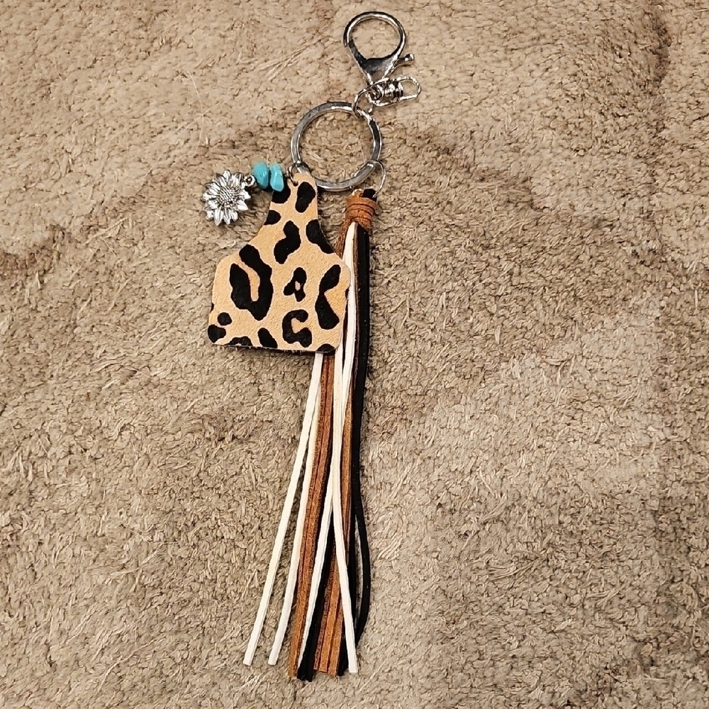 Leopard Print Cowtag Sunflower With Stone Accents And Leather Tassel Keychain